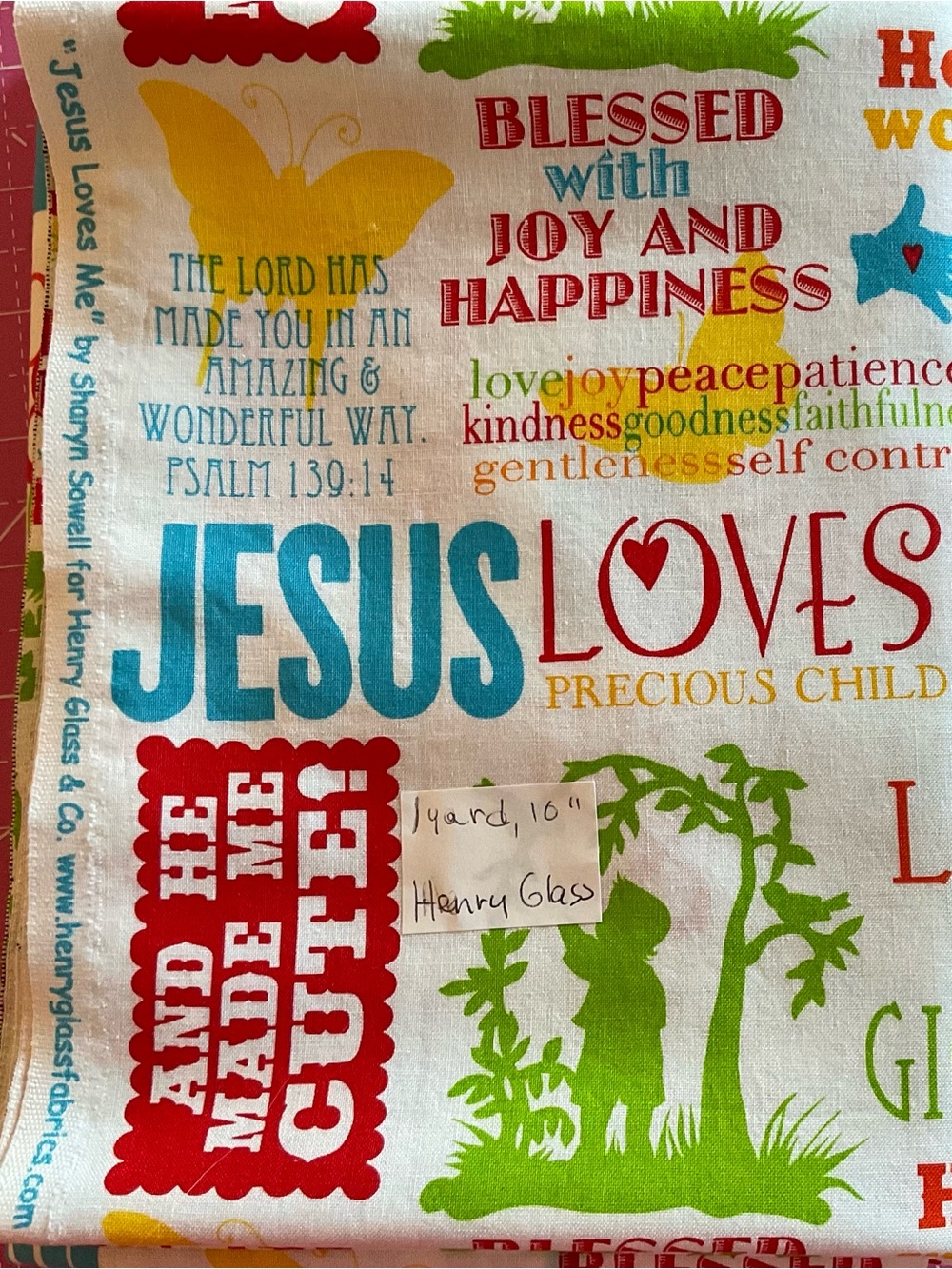 Henry Glass 'Jesus Loves' Multicolor Cotton Fabric - Blue/Red/Green/Yellow